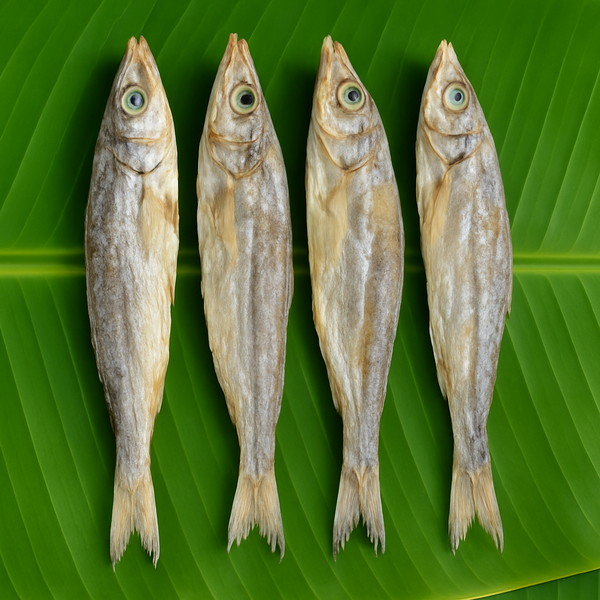 Dried small fish (karuvaadu) beautifully arranged on fresh banana leaf