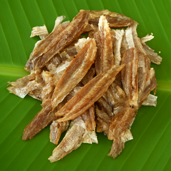 Generated dried fish strips product image on banana leaf