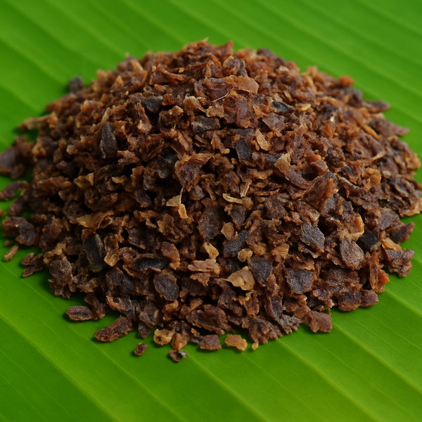 Generated dry tuna flakes with brown and black shades on banana leaf