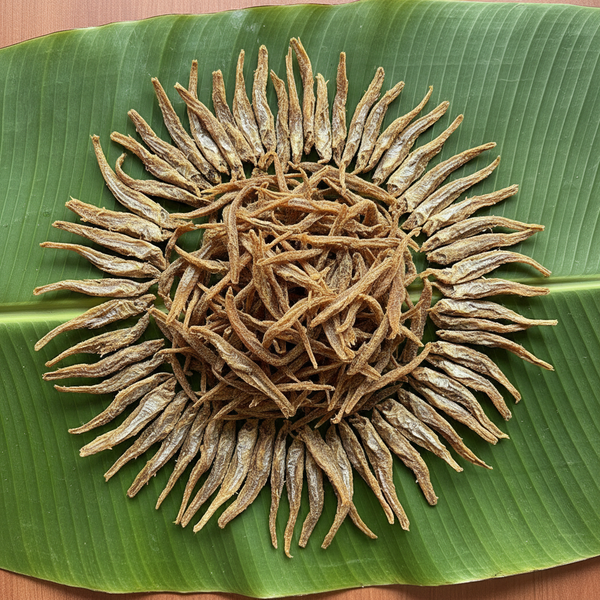 Dried fish pieces on banana leaf for Meta ads
