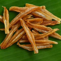 Generated dried squid strips product image on banana leaf