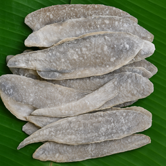 Generated dry fish product image on banana leaf
