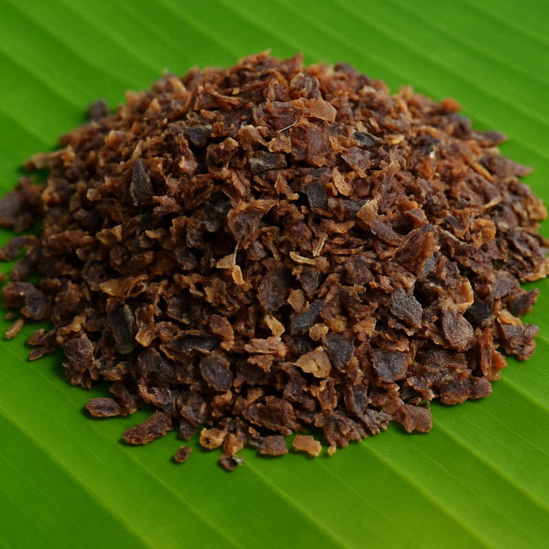 Generated dry tuna flakes with brown and black shades on banana leaf
