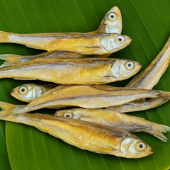 Generated small dry fish product image on banana leaf