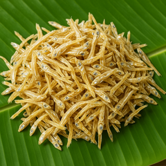 Generated tiny dry fish product image on banana leaf