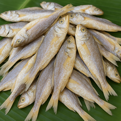 Generated whole dry fish product image on banana leaf