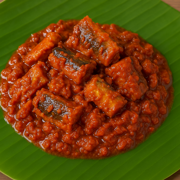 Square format Barracuda karuvadu thokku on banana leaf